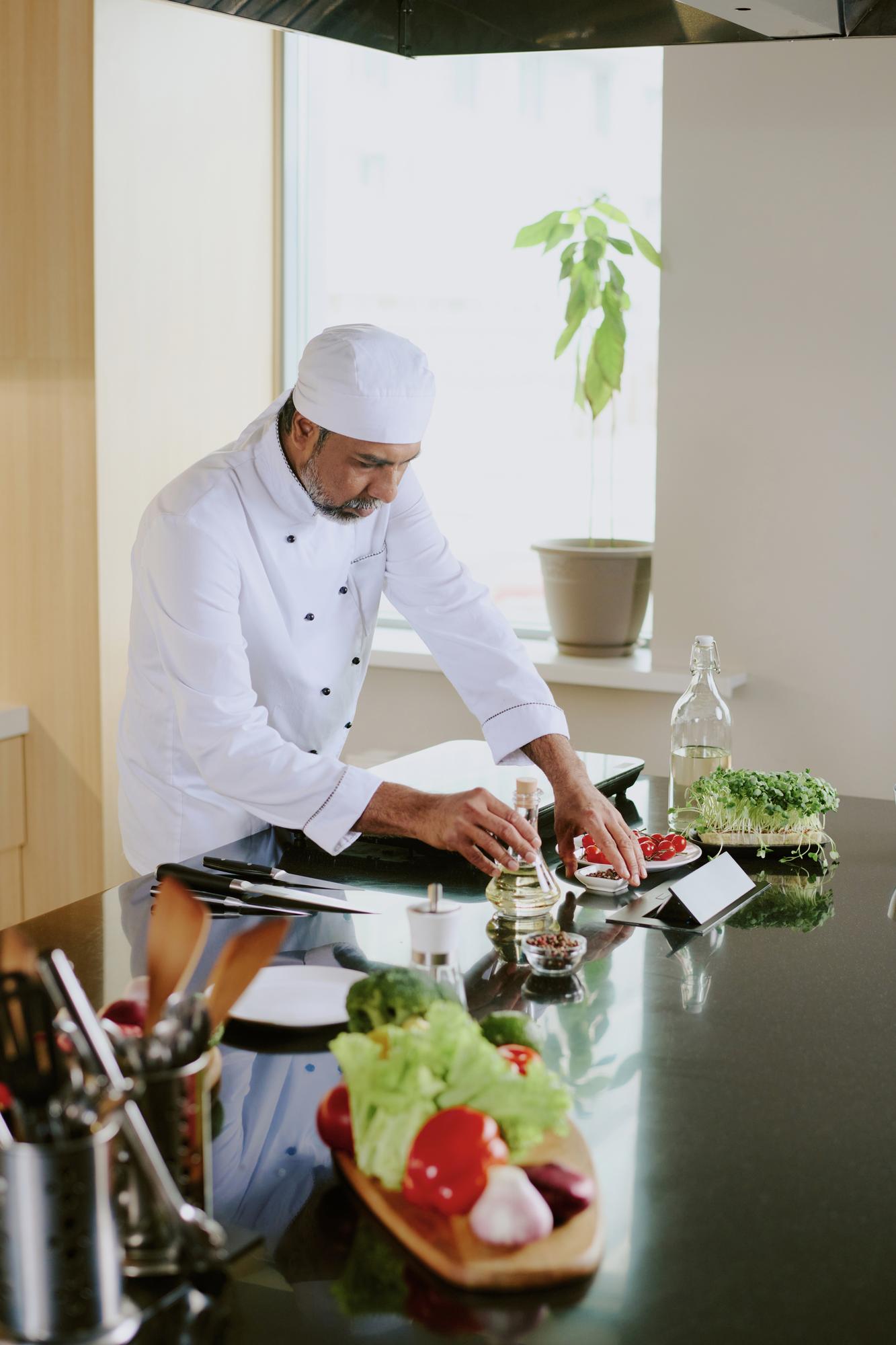 Chef demonstrating efficient prep technique